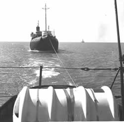 The Coast Guard tows the S.S. Meteor home to Superior in 1972.